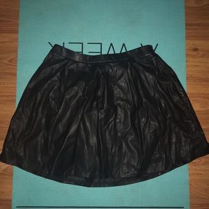 Large black leather skater skirt